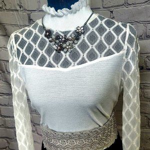 Selling a big leather tie belt and beautiful shirt.